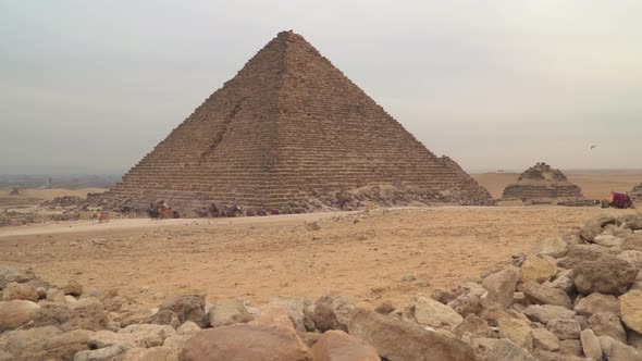 Pyramid of Menkaure in Giza. Camels at the foot of the pyramids