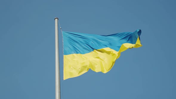 Flag of Ukraine on a Background of Blue Sky