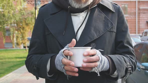 Asking for Help. Senior Man with Grey Beard Asking for Some Money Help By Citizens of City