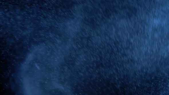 Water Spray Against Black Background. Slow Motion alt