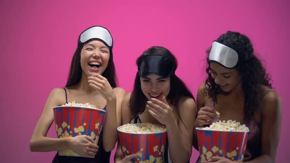 Three Girls With Eye Masks Eating Popcorn and Laughing Out Loud, Funny Comedy