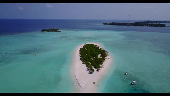 Aerial top down sky of luxury shore beach holiday by blue green lagoon and white sand background of 