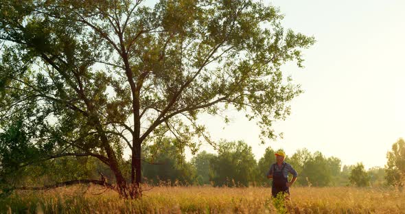 Portrait of a Male Farmer in a Wheat Field