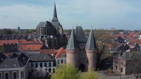 Church 'Bovenkerk' and city gate in historical city Kampen in the Netherlands