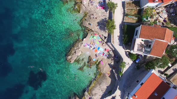 Flying above private beach of Primosten town, Croatia