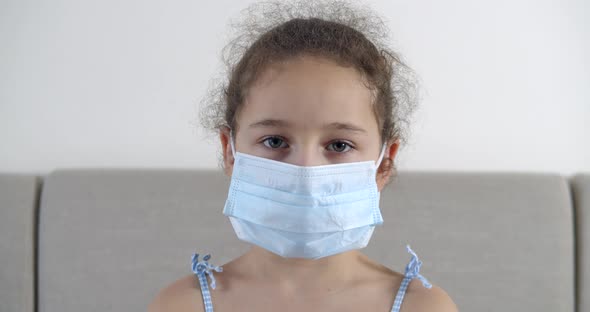 Child in a Medical Mask