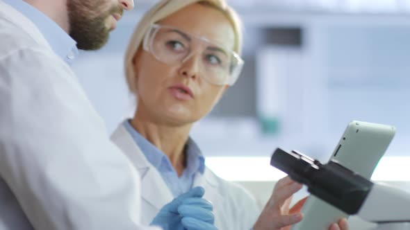 Chemists Carrying out Research in Laboratory alt