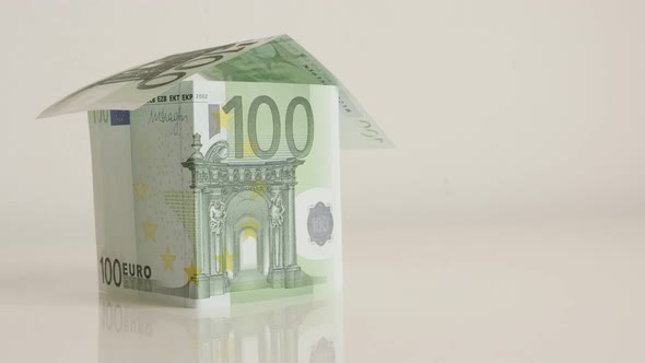Building house concept with Euro banknotes  close-up 4K 2160p 30fps UHD footage - EU paper money rea