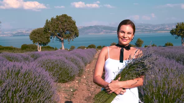 Smiling Girl in a Field in Lavenders