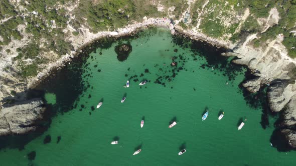 Aerial Panoramic View of Seascape with Crystal Clear Azure Sea and Rocky Shores