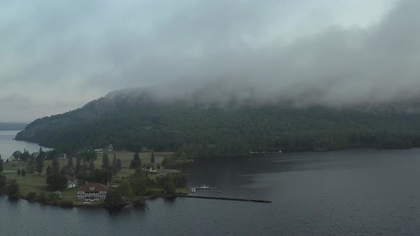 Lake Moosehead accommodation retreats at the base of Mount Kineo sunrise aerial