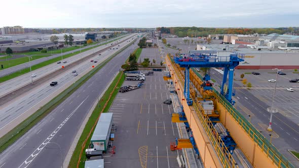 4K camera drone view of the construction site of the REM (Metropolitan Express Network) in Montreal.