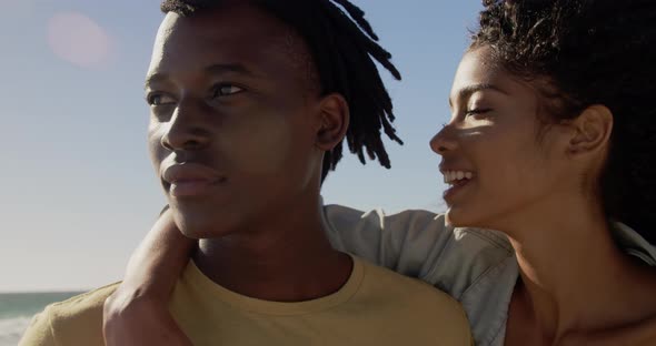 Couple embracing each other on the beach 4k