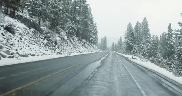 Driving on mountain road in winter