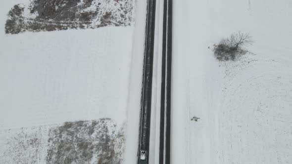 Snow covered highway in western Wisconsin. Recently plowed highway.