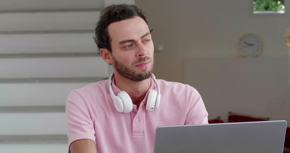 Closeup of Young Successful Entrepreneur Thoughtfully Looking Aside While Working on New Garndiose