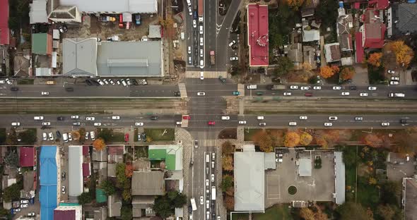 Top Down Drone Point of View - Steet City Road Intersection in Autumn Time