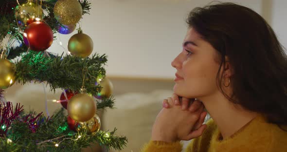 Young woman at home at Christmas 4k