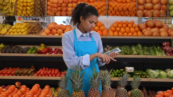 Female Making Accounting of Products in Farm Store