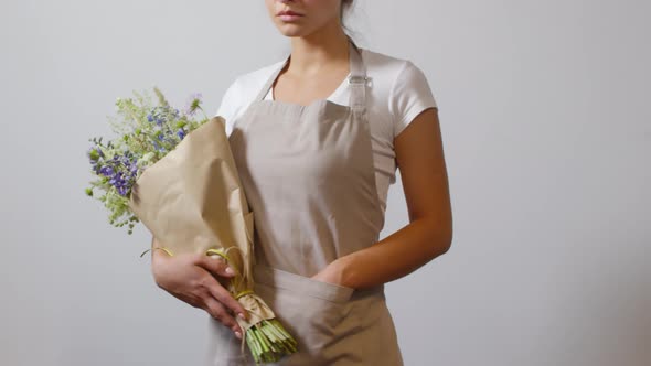 Florist Posing with Bespoke Wildflower Bouquet