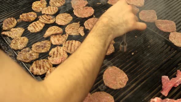 Cooking Cow Meatball Food on a Barbecue Wood Fire