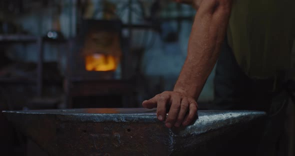 Blacksmith in Forge Closeup View of Male Hand on Old Anvil Wait Heating Furnace  Prores