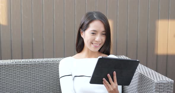 Woman working on tablet computer