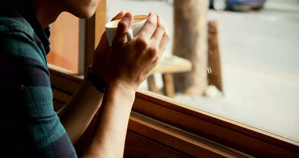 Man having coffee in the cafe 4k