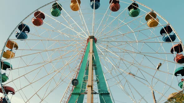 View of a ferris wheel over blue sky.  Good weather 