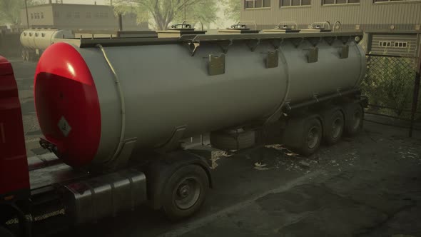 Truck with Fuel Tank and Industrial Storage Site