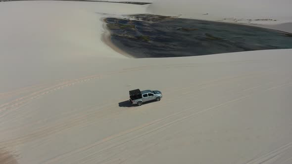 Sand dunes mountains and rain water lagoons at northeast brazilian paradise.