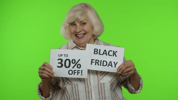 Senior Grandmother Showing Black Friday, 30 Percent Off Discount Advertisement Banners. Chroma Key