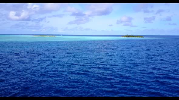 Aerial drone sky of luxury tourist beach vacation by blue sea with white sandy background of journey