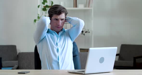 Frustrated Young Business Man Feels Headache Illness, Soreness, Thinks About Difficult Problem