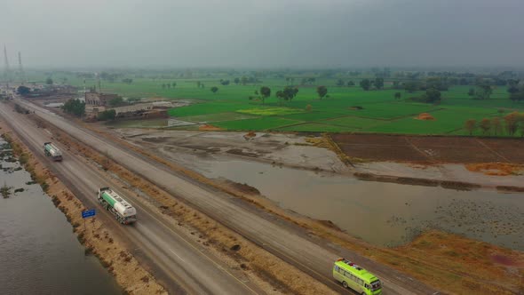 Exterior View of traffic near Green farm in Pakistan.
