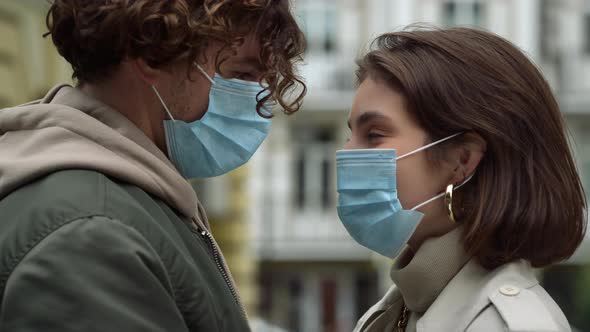 Young Couple Wearing Masks Outdoor