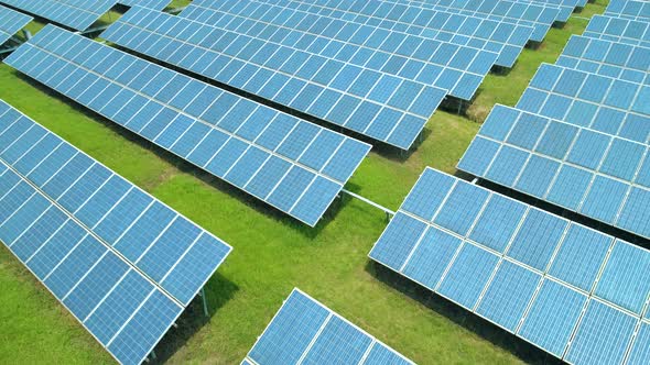 Aerial View of Solar Panels Farm (Solar Cell) with Sunlight. Production of Clean Energy. Renewable