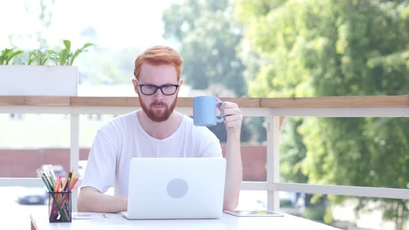 Drinking Coffee, Working Online on Laptop, Sitting in Balcony Outdoor