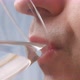 A Person Drinks Water From a Closeup Glass - VideoHive Item for Sale