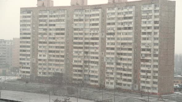 Snow Blizzard In Housing Area Winter City. Snow Storm In City In Cold December Day. Bad Weather.