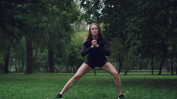 Athletic Woman Doing Warmup