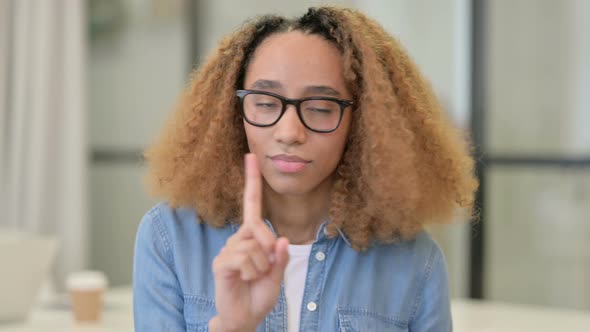 Portrait of African Woman Showing No Sign By Finger Gesture