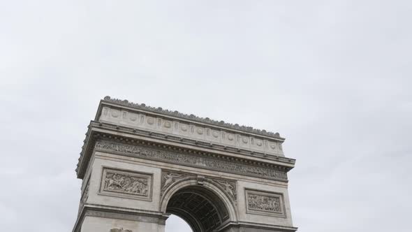 Paris and France  recognizable symbol Arc de Triomphe  by the day 4K 2160p UltraHD tilt footage - Fr