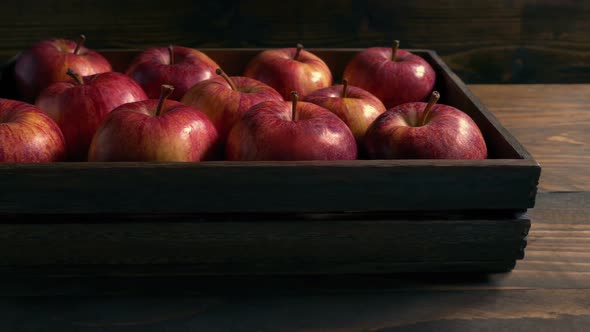 Box Of Red Apples On Table