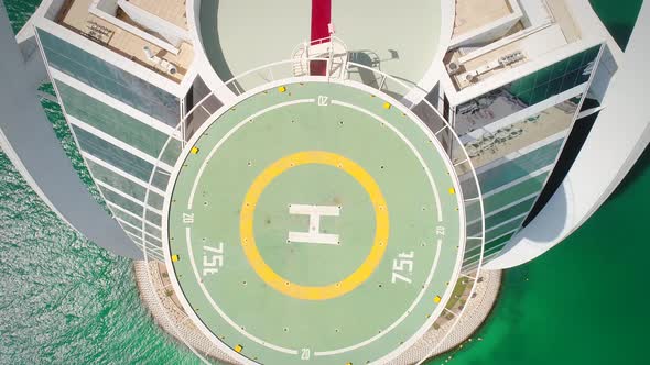 Aerial view of helipad of luxurious Burj Al Arab Hotel in the bay of Dubai.