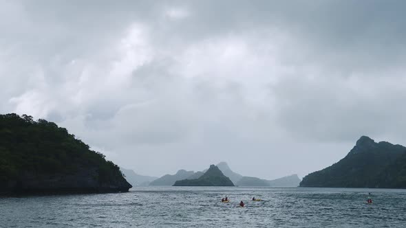 Kayaking in Thailand, Rainy Season in Thai Islands with People Travelling on Holiday and Vacation Un