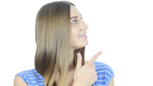 Young Girl  Pointing Aside, White Background