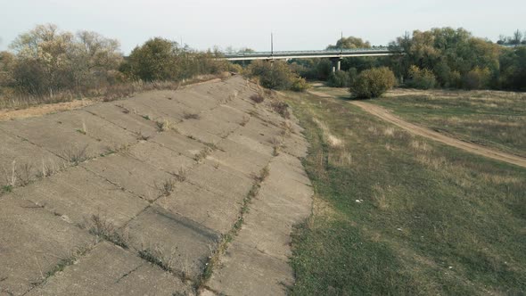 Closeup Birdseye View of the Old Dam Away From the Reservoir