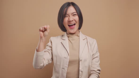 Asian business woman show counting numbers with fingers and smiling isolated