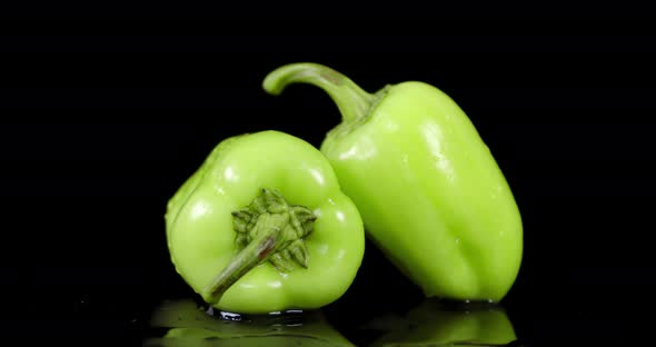 Green Sweet Peppers Slowly Rotates. 